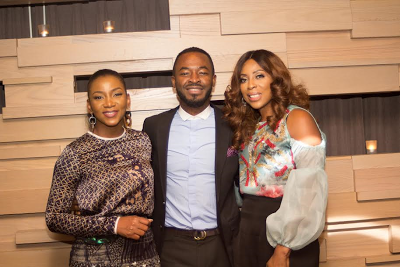 Genevieve Nnaji and Oc Ukeje pose with the celebrant