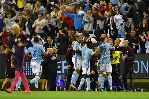 Barcelona fans look away as Celta Vigo players celebrate a goal at home. Credit: Getty Images