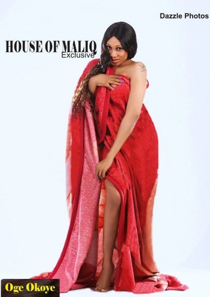 Somebody needs to explain why Oge Okoye is holding that gigantic bed cover