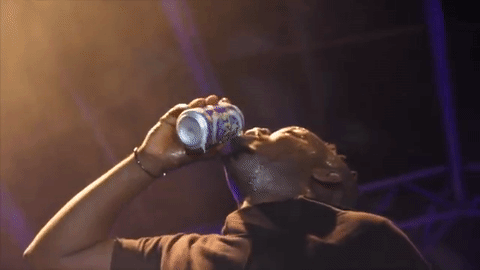M.I Abaga drank beer on stage whilst performing during a concert in Abuja last weekend. Credit: Giphy