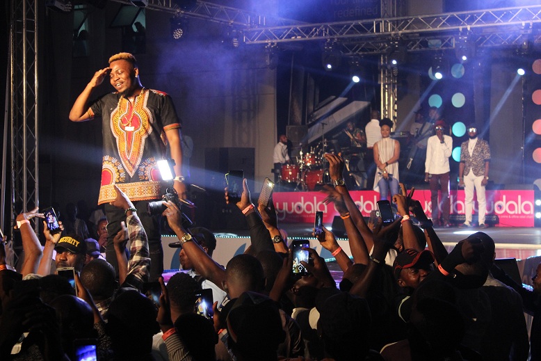 Olamide performing on stage