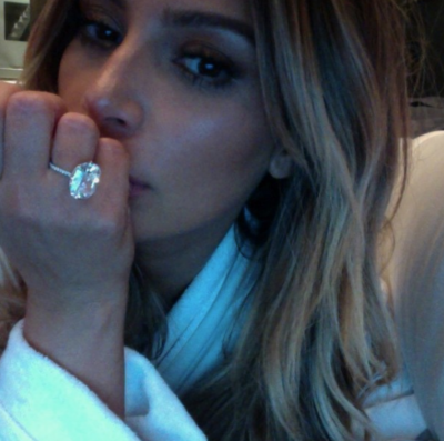 Kim shows off the new engagement ring given to her by husband, Kanye