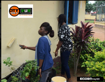 City FM staff painting