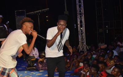 Reekado Banks performing