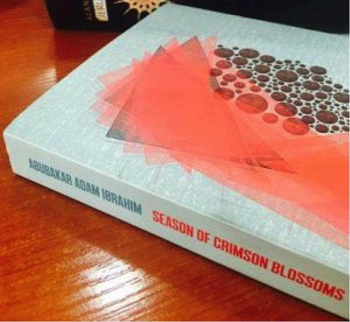 A look at the cover of 'Season of Crimson Blossoms'.