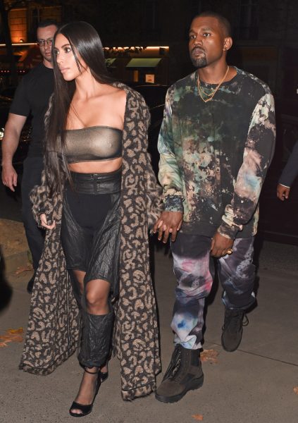 Kim Kardashian and husband, Kanye West arrive at the Off White fashion show