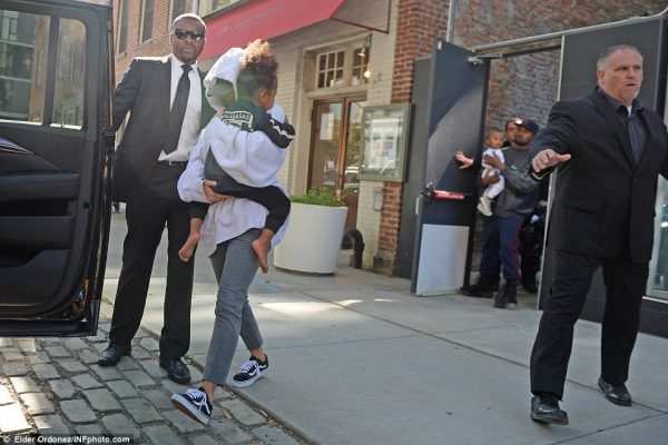 Kim carried her daughter, North