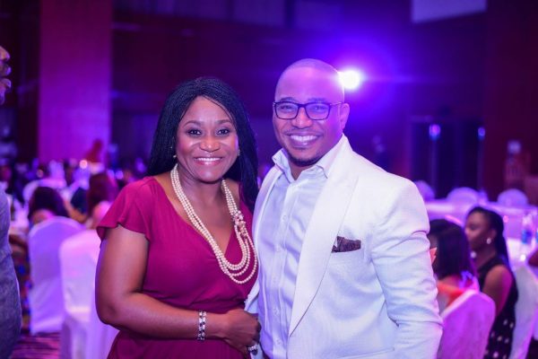 Tee A poses with wife of Ali Baba and ED Heritage Bank, Mrs Mary Akpobome