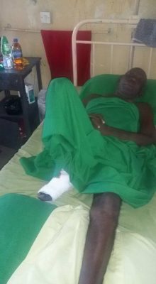 Tunde Alabi at the hospital, risks losing his leg