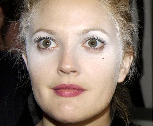 woman applied to much powder to her face