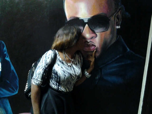 At least we can confim that with a picture of Yemi Alade kissing Flavour's portrait at Dream FM studio Enugu