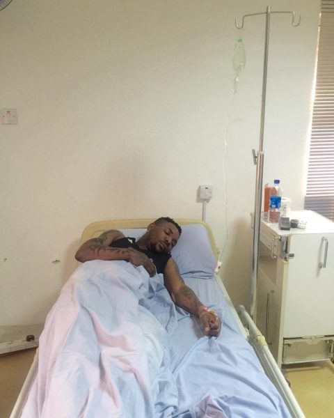 Oritsefemi 'recovering' on a hospital bed
