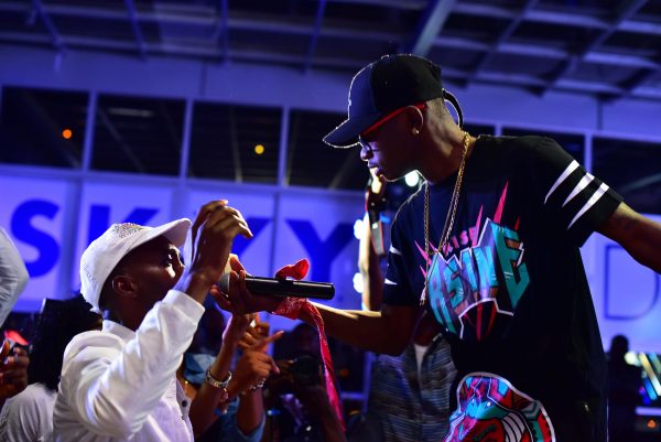 LiL Kesh with a fan at the Skyy party
