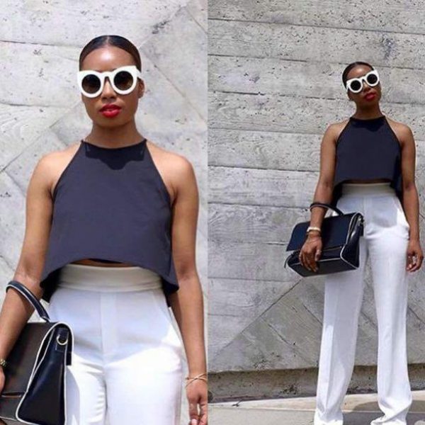 Navy blue crop top on white flare pants