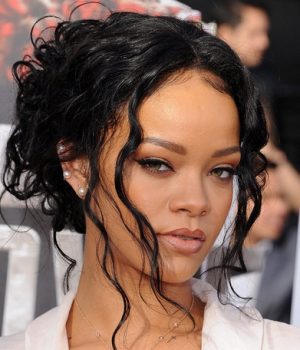 Rihanna in curly low bun
