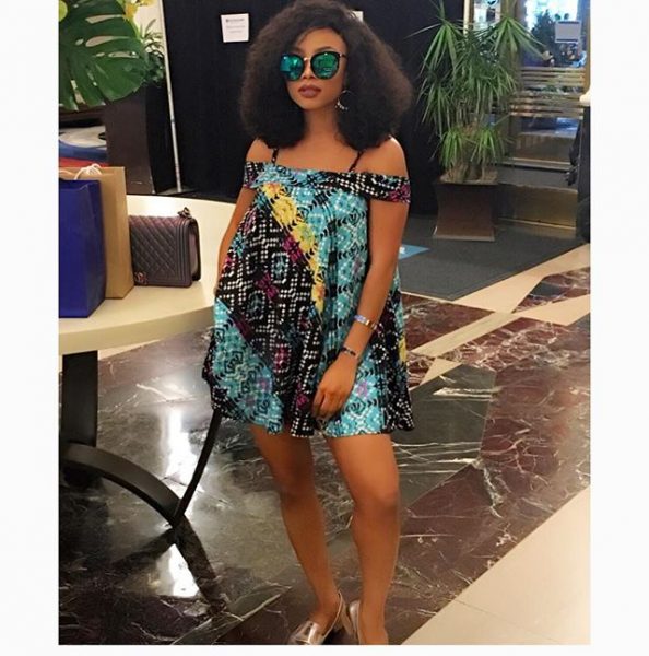 Toke looking cute in this off shoulder gown