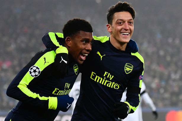 Alex Iwobi (L) celebrates after scoring a goal with his teammate, Ozil. Credit: Mirror
