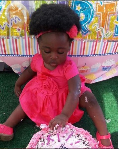 Angel okojie doing justice to her cake