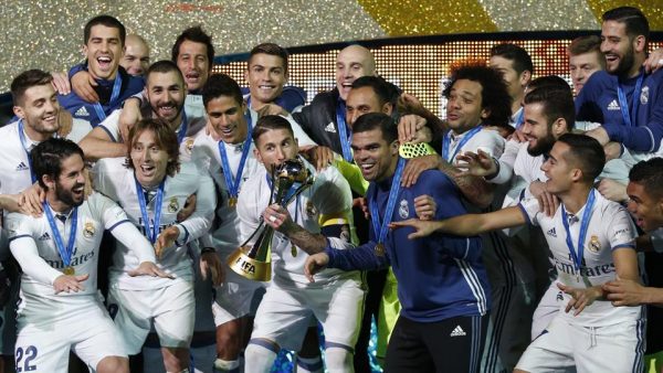 Sergio Ramos kisses the Club World Cup trophy