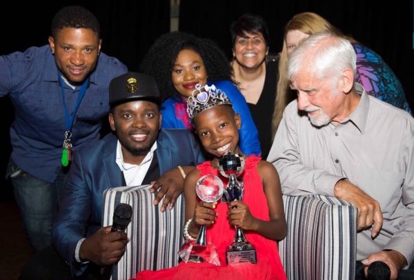 Emmanuella with her two awards in Australia