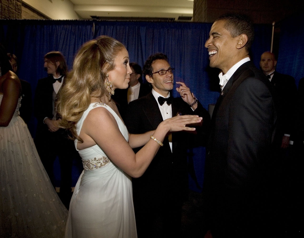 J.Lo cracking the president up.