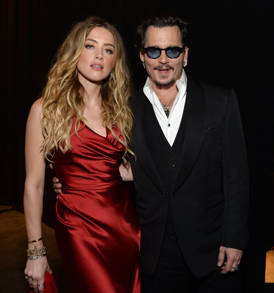 Johnny Depp and Amber Heard's divorce was settled on August 16, with Heard receiving $7 million, which she declared she was donating to American Civil Liberties Union and Children's Hospital Los Angeles. Credit: Various