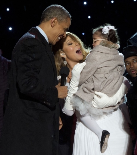 Obama charms Mariah's daughter.