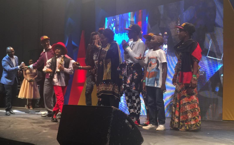 Ozzybosco on stage with friends