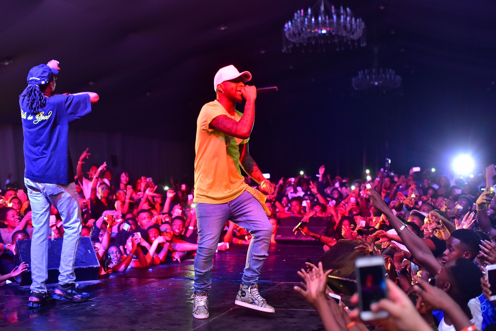 Davido performing with Migos