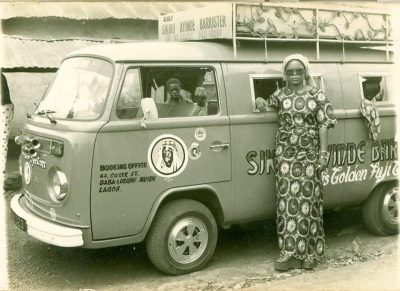 An adoring fan standing next to Barrister's band van circa 1980