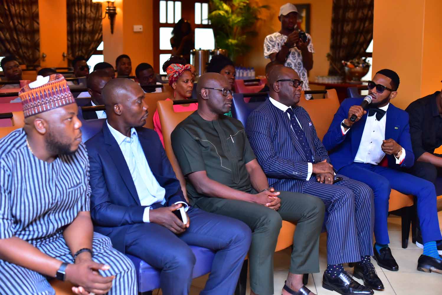 D'banj explaining the platform to guests