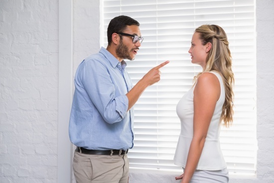 man blames woman