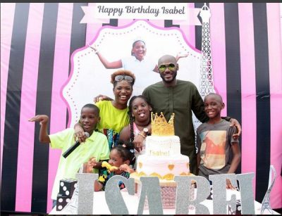 Isabel excited as she poses with her family