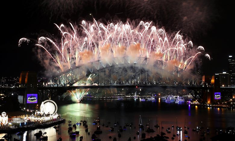 Fireworks explode off the Sydney Harbour Bridge. Photograph: Cameron Spencer/Getty Images