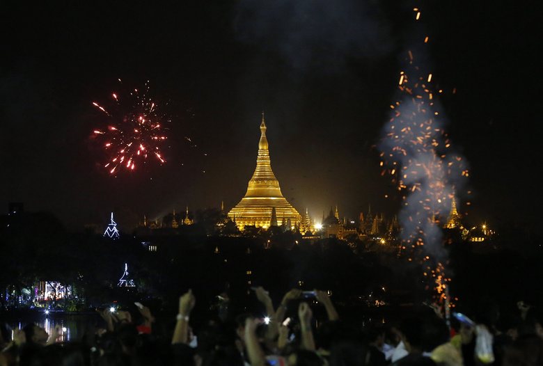 Fireworks illuminate the night sky over Myanmar’s landmark Shwedagon pagoda during the New Year’s Eve celebrations at the Kandawgyi Park in Yangon, Myanmar. Photograph: Nyein Chan Naing/EPA