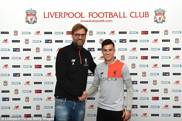 Coutino and Klopp after the signing of the contract