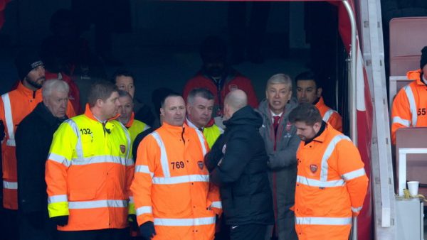 Wenger sent off for pushing Anthony Taylor in the match against Burnley