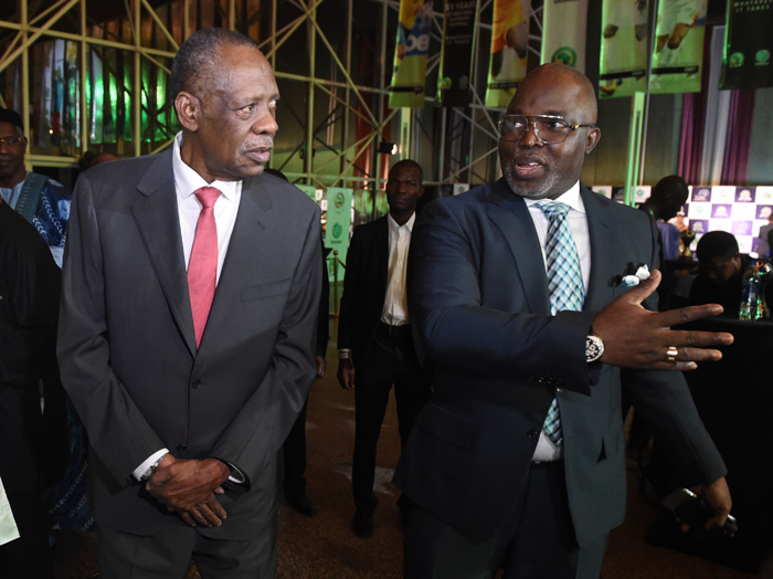 CAF President Issa Hayatou (L) and NFF chairman Amaju Pinnick attend the 25th Confederation of African Football awards in Abuja, Nigeria on January 5, 2017.