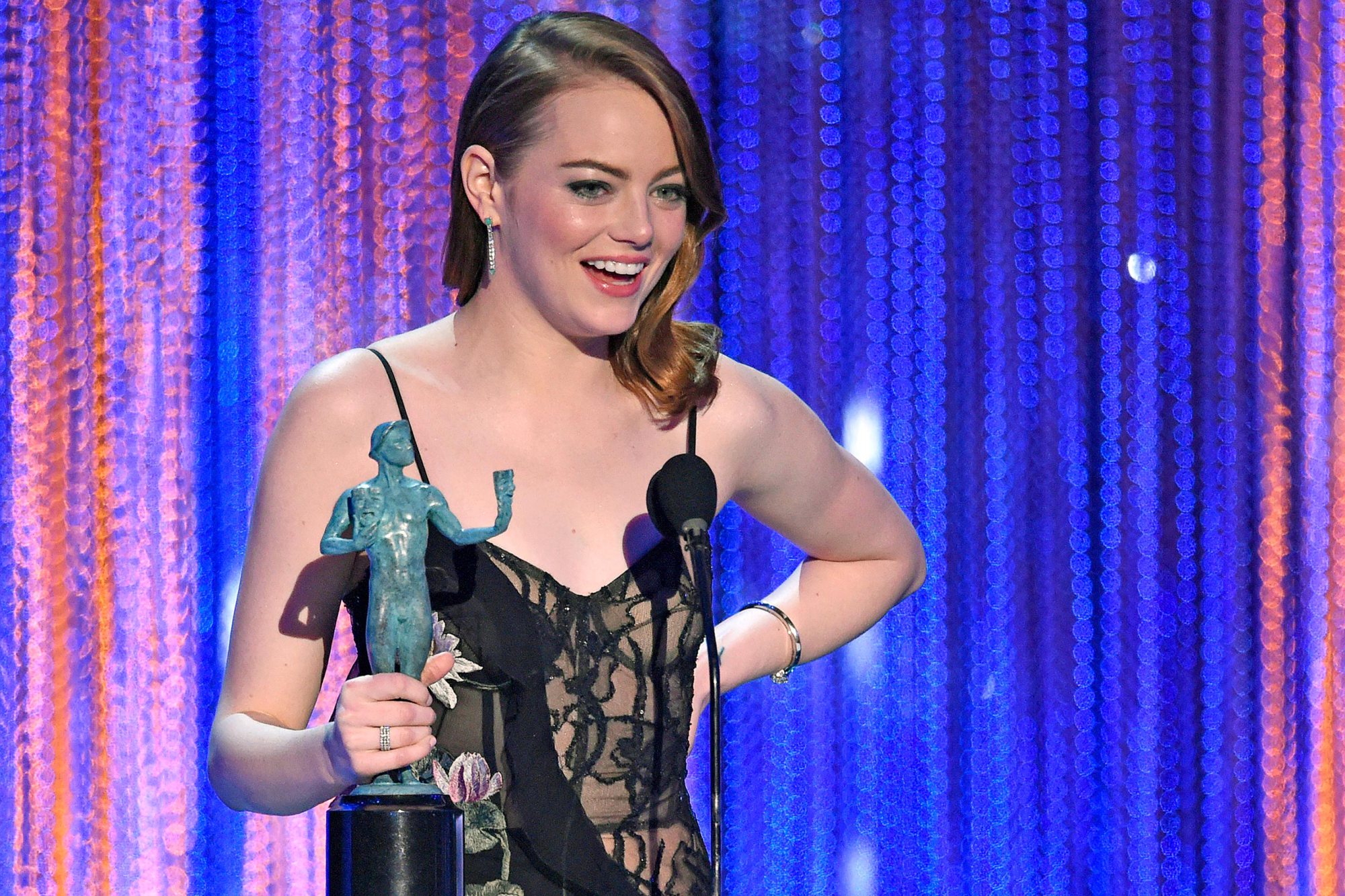 Emma Stone accepts the award for outstanding performance by a female actor in a leading role for "La La Land" at the 23rd annual Screen Actors Guild Awards at the Shrine Auditorium & Expo Hall on Sunday, Jan. 29, 2017, in Los Angeles. (Photo by Chris Pizzello/Invision/AP)