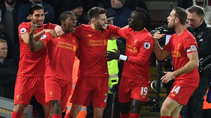 Georginio Wijnaldum celebrates goal against Manchester City with teammates.