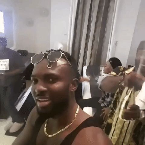 Harrysong popped champagne to celebrate his comeback from police custody on Friday, January 27, 2017. Credit: Giphy.