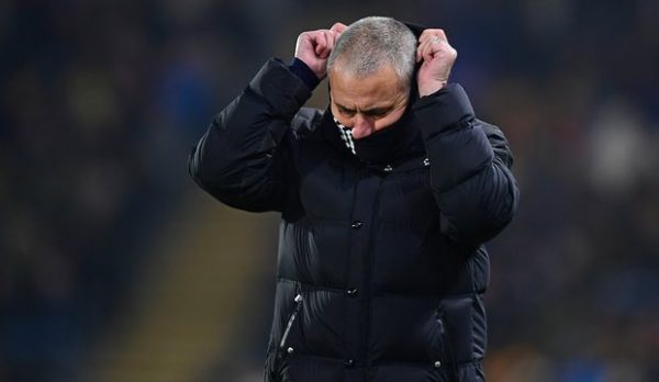Man. Uniited manager Jose Mourinho feeling the cold on a freezing night at Hull. Photo: Chris Vaughan/CameraSport/Getty Images