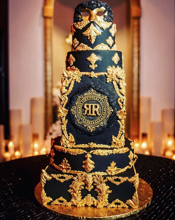 The birthday cake with RR inscribed on it.