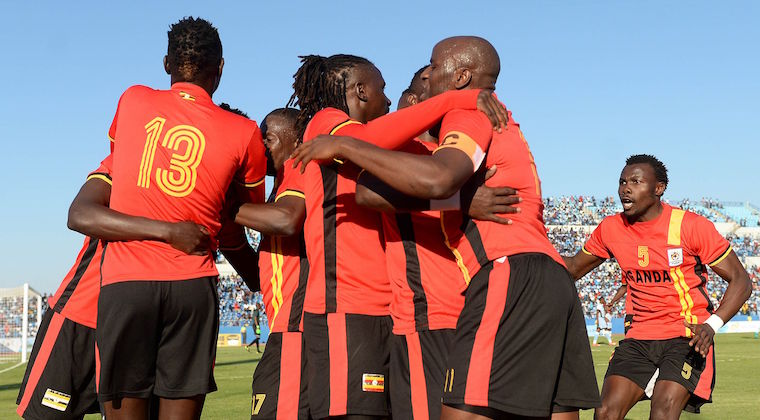 Uganda's players celebrate after midfielder Luwagga Kizito scored a goal during the AFCON 2017 qualifying match between Botswana and Uganda at the Francistown Stadium in Botswana. Photo: AFP