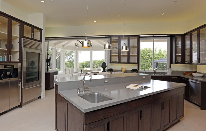 The chef's kitchen comes equipped with center island