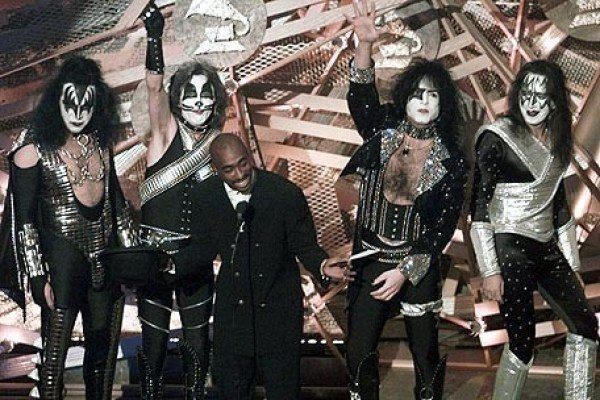 The closest 2pac came to the Grammys was presenting an award with rock group Kiss in 1996.