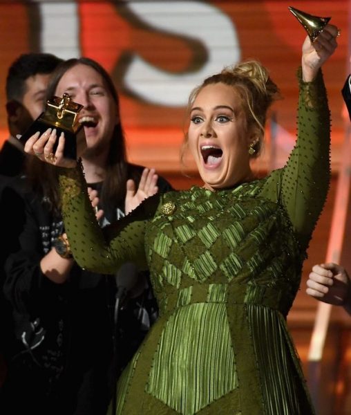 Adele broke her plaque in two!