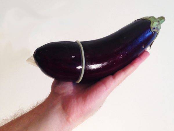 Condom barely contains the eggplant