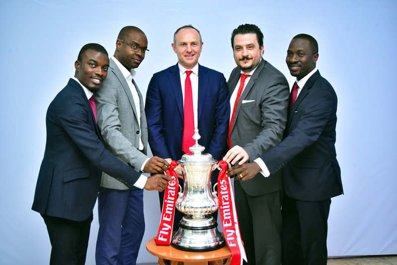 Assistant Brand Manger, Star Lager Beer, Kolawole Akintimehin, Portfolio Manager, National Premium, Nigerian Breweries, Tokunbo Adodo, Partnership Manger, Arsenal Football Club, Gordon Tannock;Marketing Director, Nigerian Breweries; Franco Maria- Maggi; Senior Brand Manager, Star Lager Beer, Abayomi Abidakun are pictured at the Nigerian breweries headquarters alongside the trophy just two weeks after the club won it for a record 13th time.
