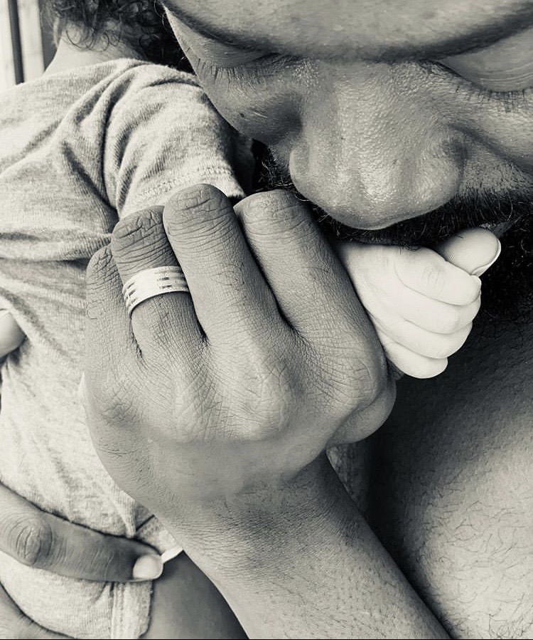 Adekunle Gold and his baby